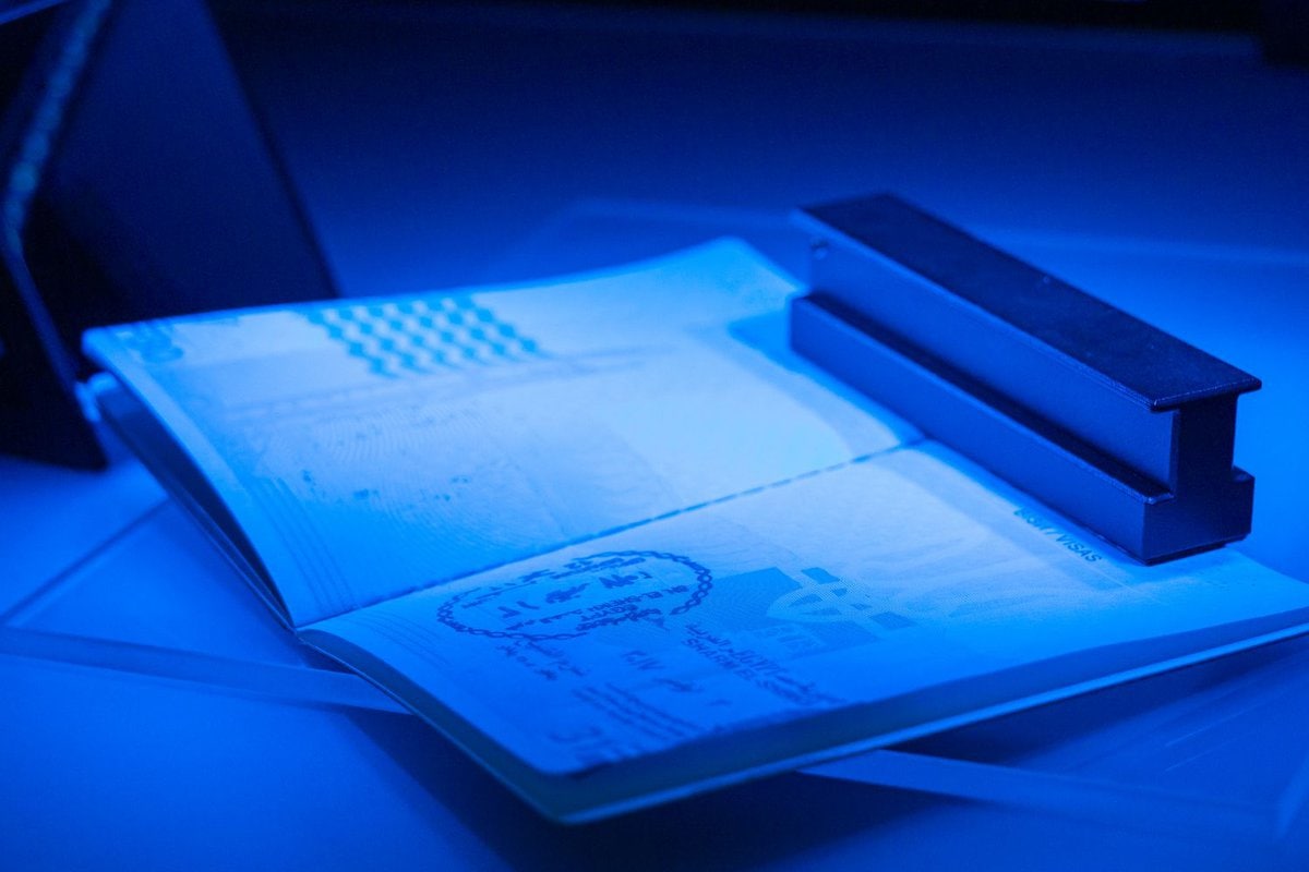 checking the passport for fraud in uv