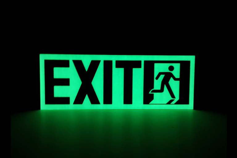 aluminum glow in the dark sign with exit text